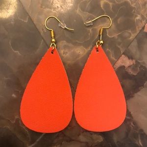 Homemade orange stylish leather earrings